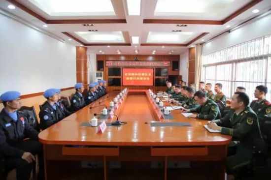 热烈欢迎百色市赴利比里亚维和警察防暴队员凯旋