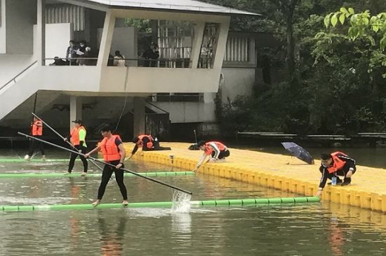 广西师范大学乐群志愿者为“壮族三月三,民族体育炫”活动增添光彩